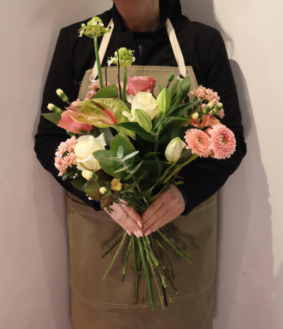 Soft Serenity by Octagon Flowers Bolton - A beautiful hand-tied bouquet featuring creamy white roses, lilies, peach roses and blush gerberas, finished with lush greenery for a fresh, uplifting look. Perfect for birthdays,