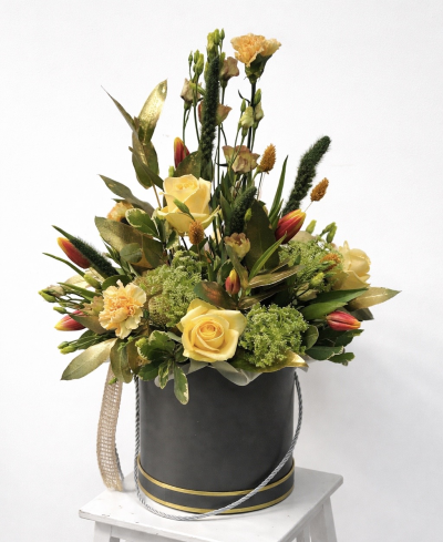Vintage Gold - Vintage Gold is a vintage floral arrangement by Octagon Flowers, featuring avalanche peach roses, peach carnations, tulips, gold foliage and dried accents.
