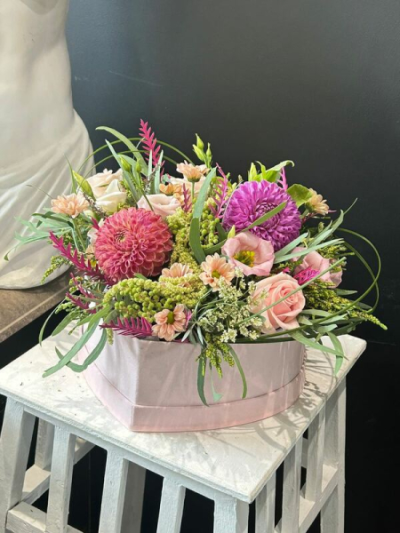 Romantic Hatbox - Indulge in romance with Octagon Flowers' 'Romantic Hatbox'. Featuring lush pinks and purples, this exquisite arrangement radiates elegance.
