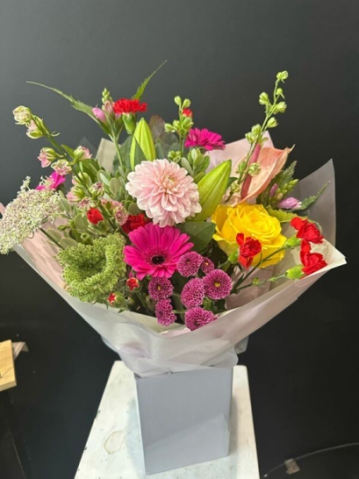 Floral Belle - Brighten any occasion with 'Floral Belle' from Octagon Flowers, Bolton. This vibrant bouquet bursts with lively colours.